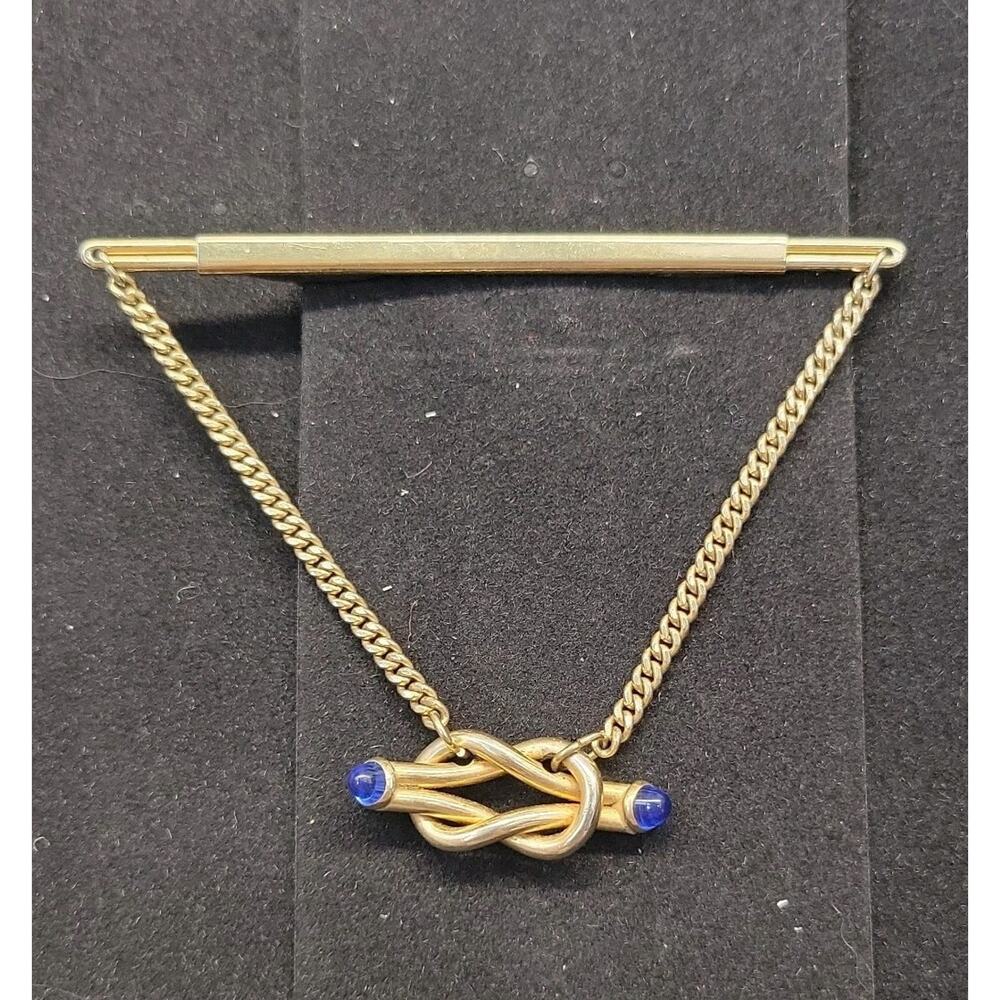 Vintage SWANK Blue Cabochon Goldtone Forever Knot Adjustible Tie Clip Bar